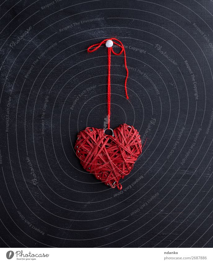 small wicker red heart hangs on a rope Design Decoration Feasts & Celebrations Valentine's Day Wedding Wood Heart Old Love Dark Retro Red Black Romance Idea