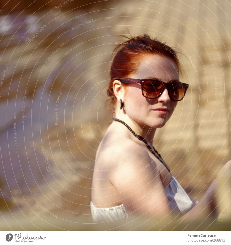 Wearing huge sun glasses. Feminine Young woman Youth (Young adults) Woman Adults 1 Human being 18 - 30 years Fashion Accessory Earring Sunglasses Red-haired