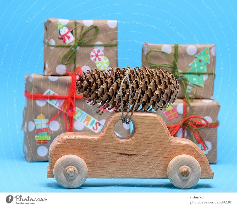 wooden machine carries a rope tied cone Winter Decoration Feasts & Celebrations Christmas & Advent New Year's Eve Nature Tree Transport Car Toys Wood Movement