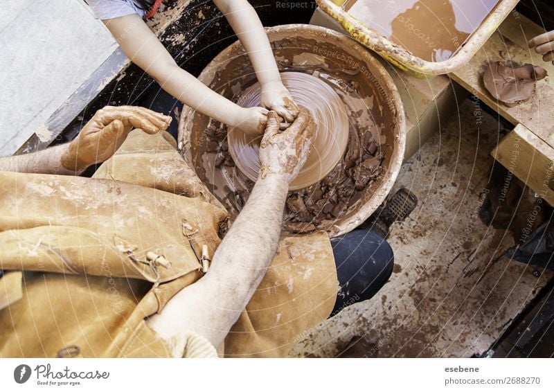Person working with clay Bowl Pot Handicraft Work and employment Craft (trade) Human being Woman Adults Man Fingers Art Touch Make Dirty Wet Brown Creativity