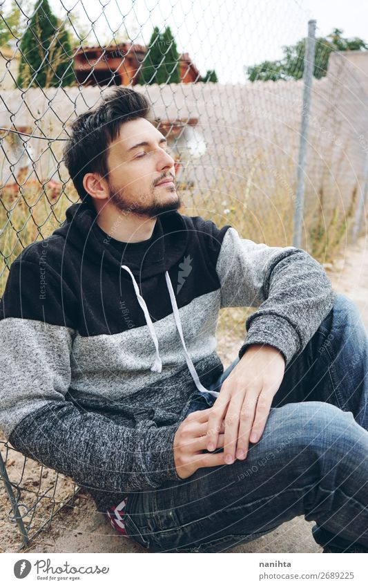 A young attractive man in calm Lifestyle Style Wellness Harmonious Senses Relaxation Calm Human being Masculine Man Adults 1 30 - 45 years Sweater Beard