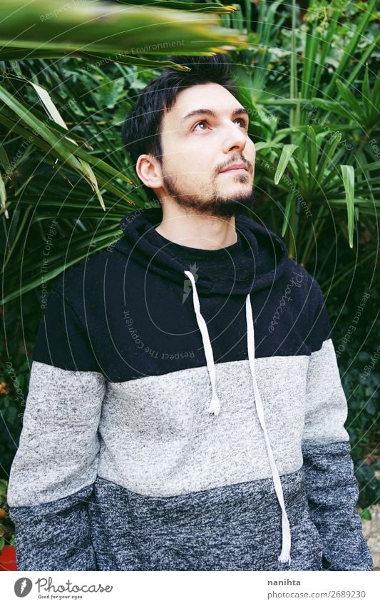 A young attractive man surrounded by leaves Lifestyle Style Exotic Human being Masculine Man Adults 30 - 45 years Nature Plant Leaf Beard Cool (slang) Eroticism