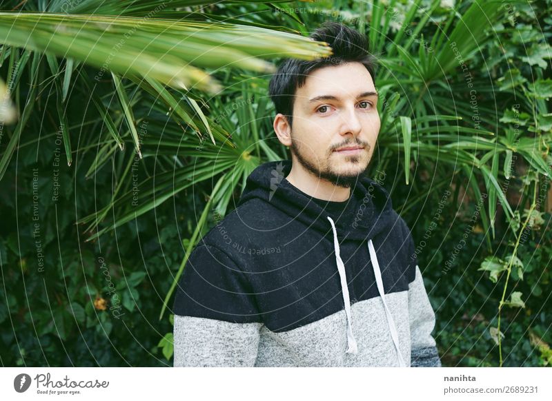 young attractive man in calm surrounded by plants Lifestyle Style Face Human being Masculine Young man Youth (Young adults) Man Adults 1 30 - 45 years Nature