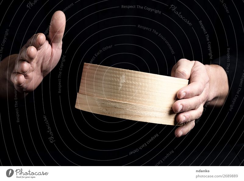 two male chef hands hold a round wooden sieve Dough Baked goods Bread Nutrition Table Kitchen Human being Man Adults Hand Sieve Wood Make Dark Fresh Black White