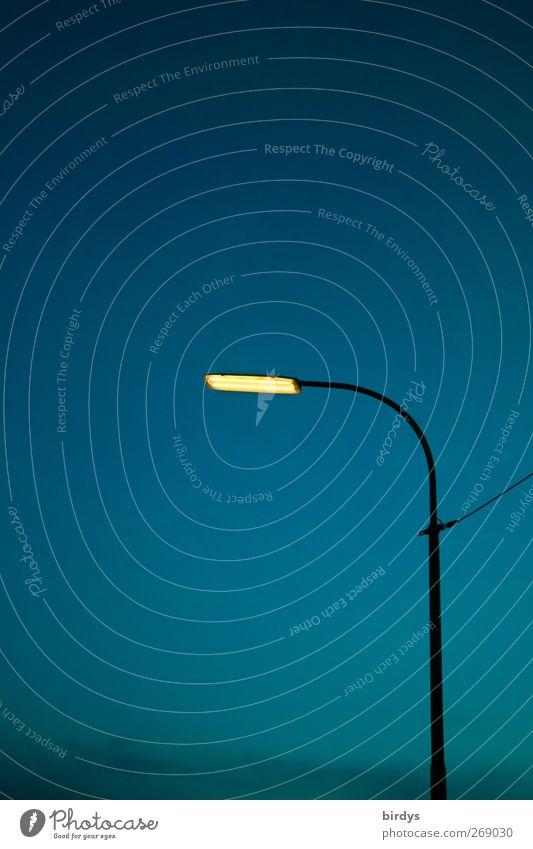Illuminating Street lighting Illuminate Authentic Blue Yellow Energy Town Light Curved 1 Cable Night sky Lamp Colour photo Exterior shot Deserted