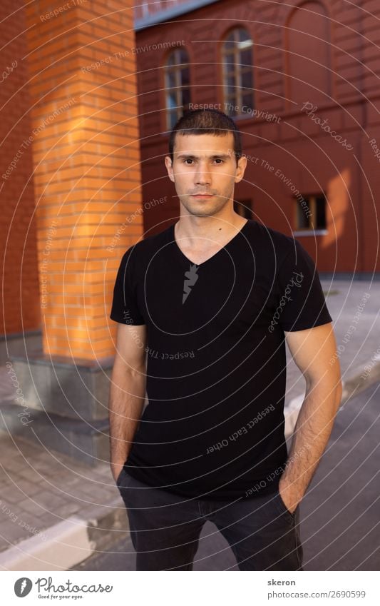 brutal guy in a black t-shirt Lifestyle Beautiful Personal hygiene Wellness Harmonious Well-being Leisure and hobbies Summer Party Event Sports Fitness