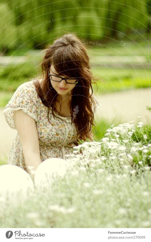 Flowered. Feminine Young woman Youth (Young adults) Woman Adults Hair and hairstyles 1 Human being 18 - 30 years Nature Natural material Blossom Park Garden