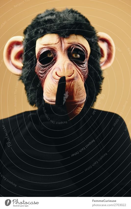 Person with monkey mask making psst gesture 1 Human being Joy Gesture Calm Demand keep quiet Mask Monkeys Mysterious Chimpanzee Carnival Carnival costume