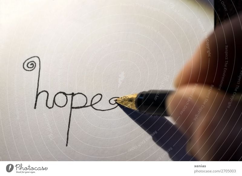 hope - handwritten with pen on white paper Hope by hand Fingers Thumb Fountain pen Pen Stationery Paper Characters Write Gold Black White Emotions Studio shot