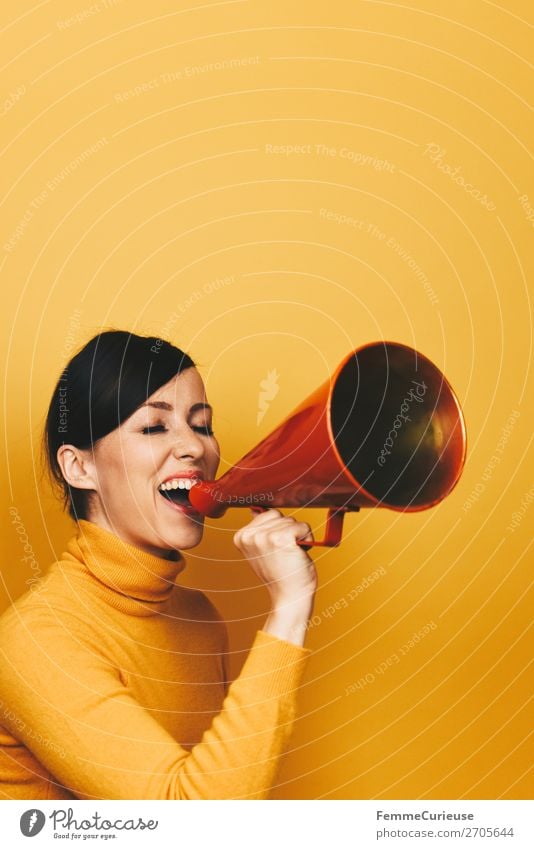 Woman making an announcement with a red megaphone Feminine Adults 1 Human being 18 - 30 years Youth (Young adults) 30 - 45 years Communicate Megaphone Scream