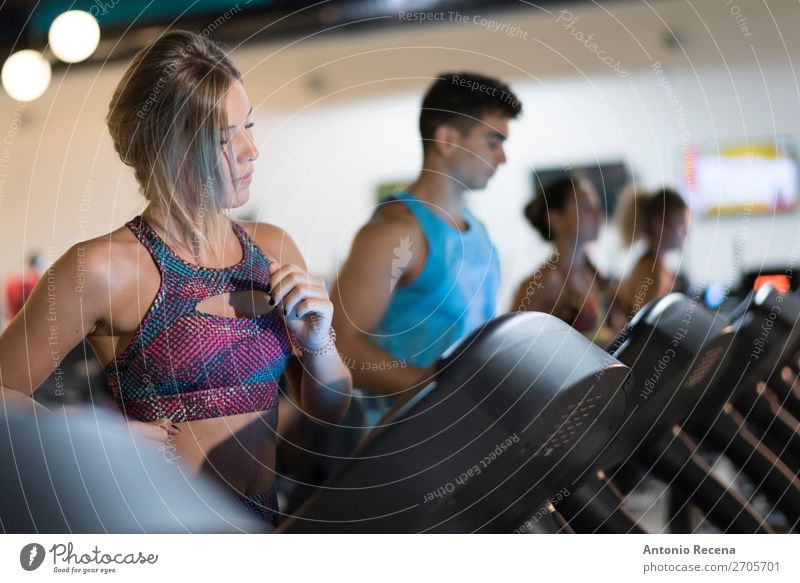 treadmill training Lifestyle Spa Young man Youth (Young adults) Woman Adults Man 4 Human being Blonde Fitness Together Determination Effort Energy Concentrate