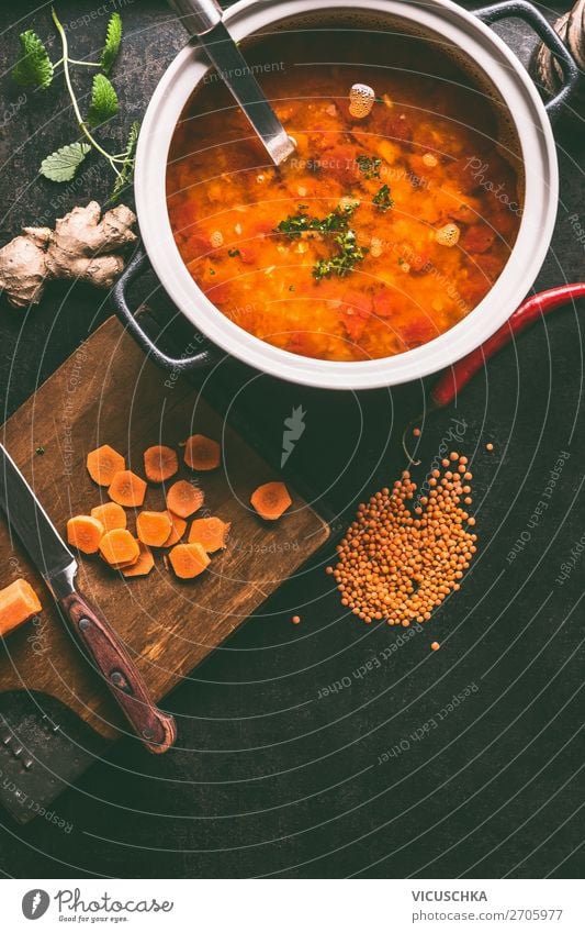 Saucepan with delicious lentil soup Food Soup Stew Lunch Organic produce Vegetarian diet Diet Pot Style Design Healthy Eating Living or residing Table Kitchen