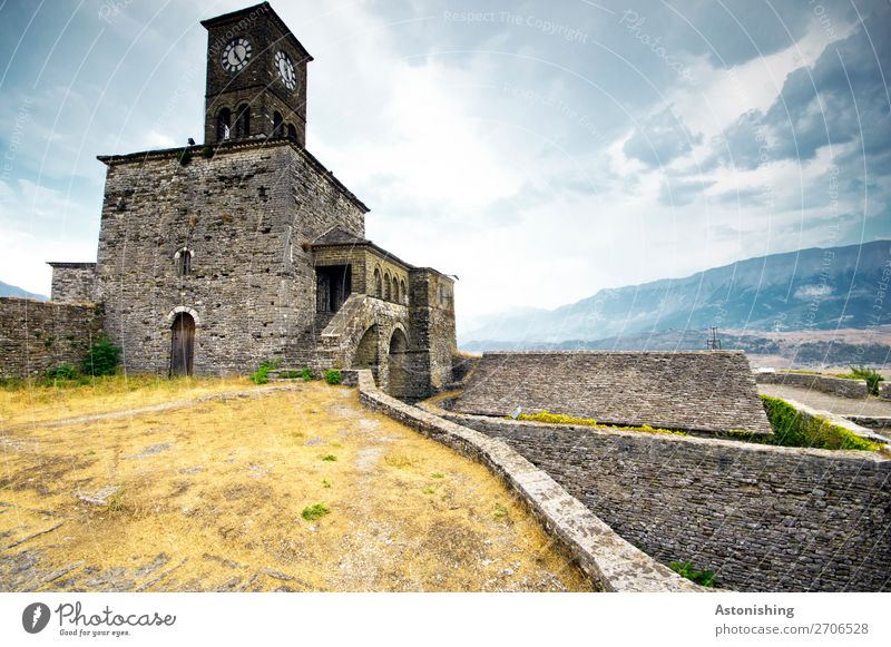 Clock tower in Gjirokastra Environment Nature Sky Clouds Horizon Weather Grass Bushes Hill Mountain Albania Town Old town Tower Manmade structures Building