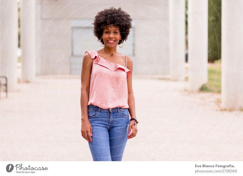 portrait of a beautiful afro american woman Lifestyle Happy Beautiful Hair and hairstyles Summer Woman Adults Landscape Park Fashion Jeans Afro Smiling