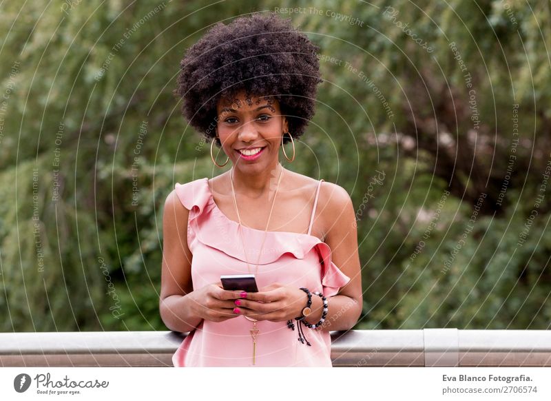beautiful afroamerican woman using mobile phone Lifestyle Style Happy Beautiful Hair and hairstyles Summer To talk PDA Technology Woman Adults Nature Landscape