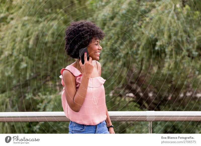 beautiful afroamerican woman talking on mobile phone Lifestyle Style Happy Beautiful Hair and hairstyles Leisure and hobbies Summer To talk Cellphone Technology
