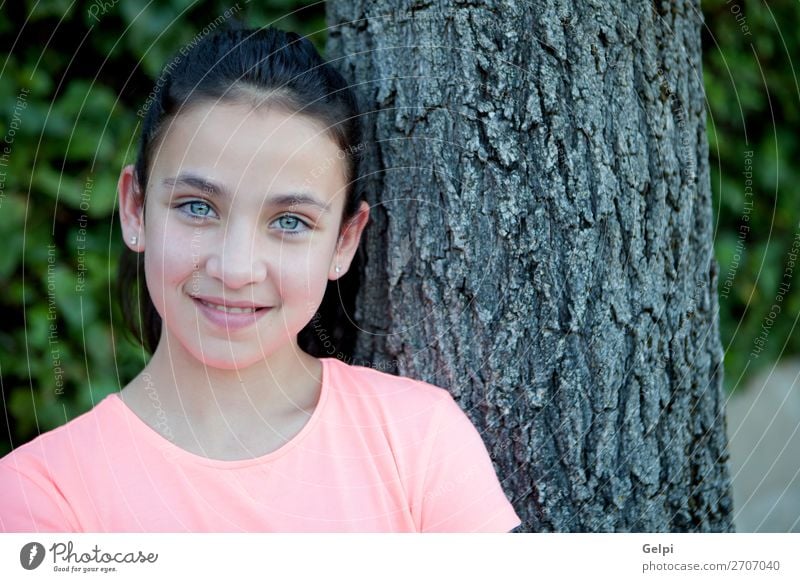 Happy preteen girl with blue eyes smiling Lifestyle Style Joy Beautiful Face Calm Summer Child Human being Woman Adults Youth (Young adults) Tree Fashion