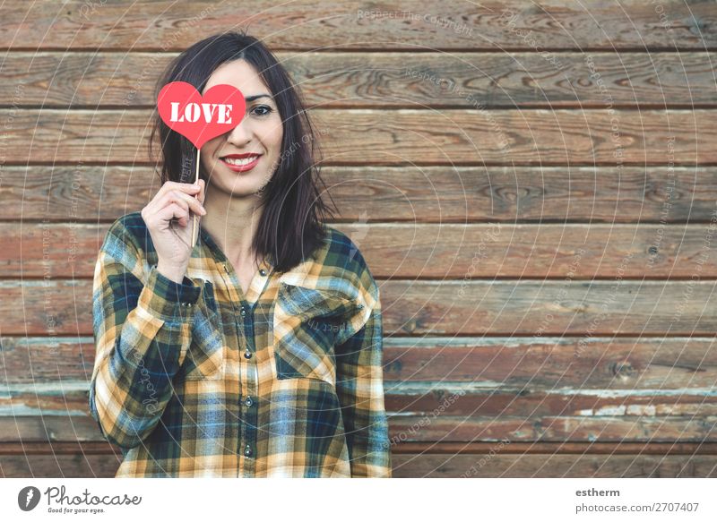 Love,young woman with a heart covering his eye Lifestyle Style Joy Beautiful Face Vacation & Travel Summer Feasts & Celebrations Valentine's Day Human being