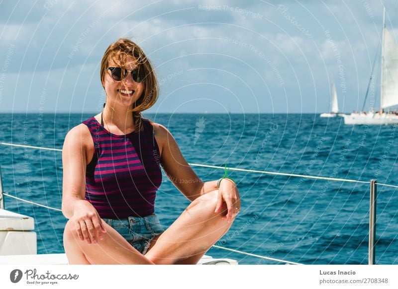 Girl in a boat near Saona Island, Dominican Republic Happy Vacation & Travel Tourism Summer Beach Ocean Woman Adults Environment Nature Sand Coast Watercraft