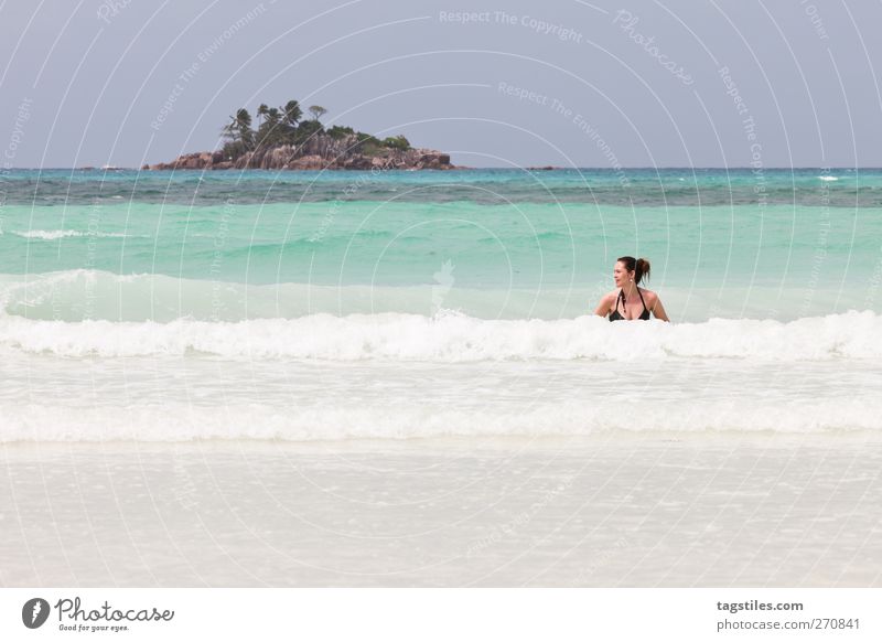 ST. PIERRE Woman Ocean Seychelles Saint-Pierre Praslin Nature Vacation & Travel Relaxation Swimming & Bathing Float in the water Waves Surf Island