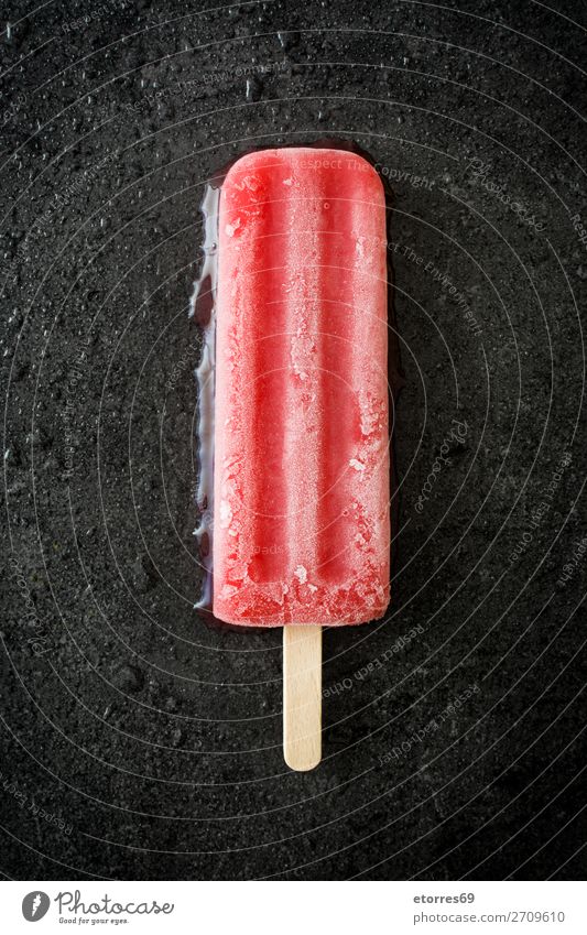 Strawberry popsicle on black slate background. Food Healthy Eating Food photograph Fruit Dessert Ice cream Candy Fresh Cold Sweet Red Black Summer