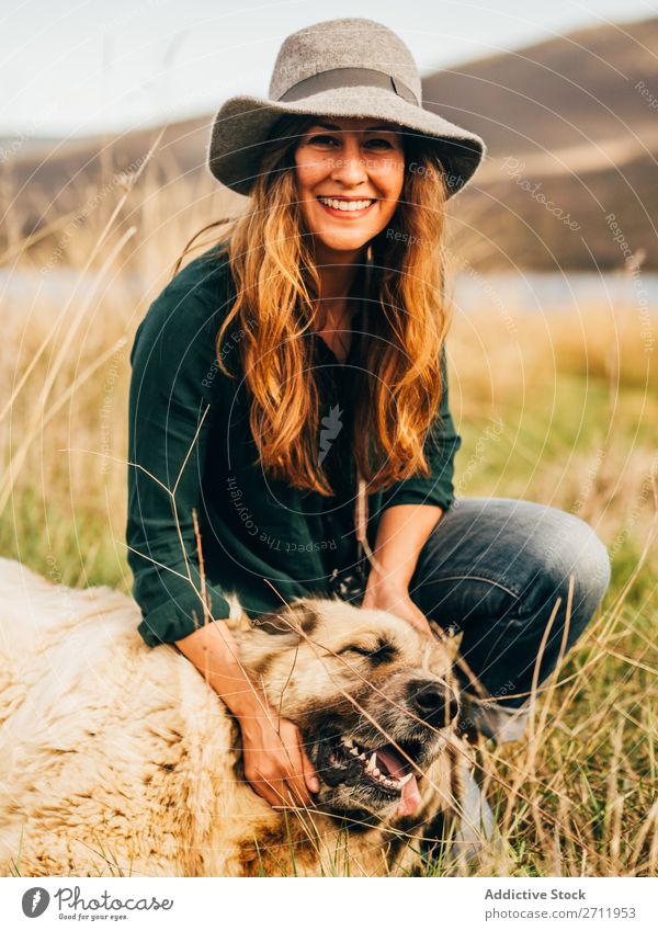 Smiling woman with dog Woman Dog stroking Nature Happy Animal Pet Friendship Adults big Beautiful Youth (Young adults) Love Leisure and hobbies Lifestyle