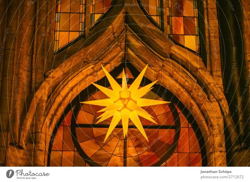 Herrnhuter Stern hangs from a church in Advent Christmas & Advent Facade Hang Hope Tradition Advent star Herrnhuter Star Church window Christmas star