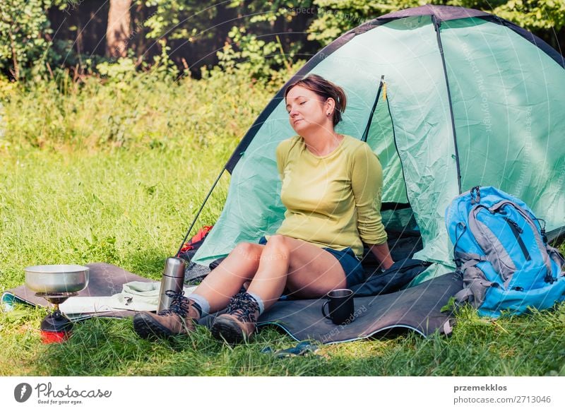 Spending a vacation on camping. Woman resting next to tent Lifestyle Relaxation Vacation & Travel Tourism Trip Adventure Camping Summer vacation Adults 1