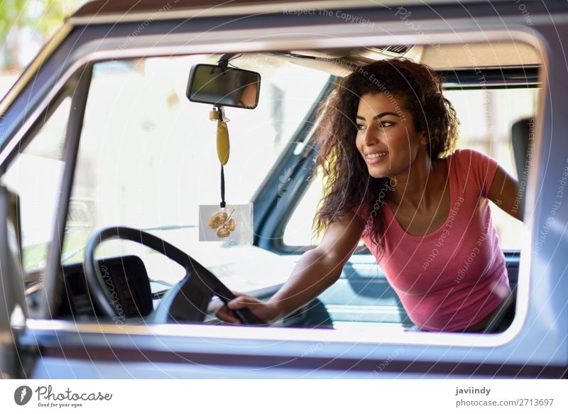 Arab girl inside an old van parked in a campsite Lifestyle Style Joy Happy Beautiful Hair and hairstyles Leisure and hobbies Vacation & Travel Trip Camping