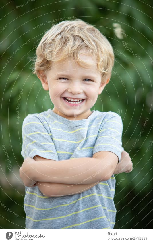 Happy child with blue t-shirt Joy Beautiful Summer Sun Garden Child Human being Baby Toddler Boy (child) Family & Relations Infancy Nature Grass Park T-shirt