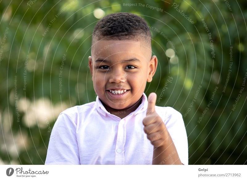 Happy child covering his eye Lifestyle Joy Face Playing Child Human being Boy (child) Man Adults Infancy Happiness Small Funny Cute Black Emotions Concern