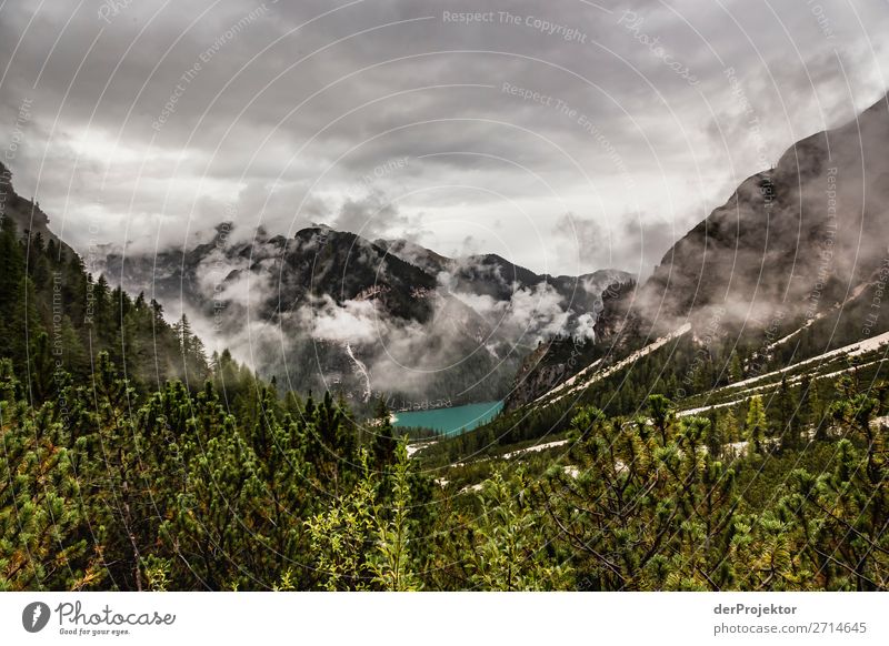 Braies Lake with clouds in the Dolomites XIII Tourism Structures and shapes Copy Space bottom Vacation & Travel Light Copy Space right Shadow Contrast