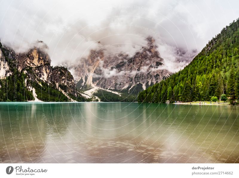 Braies Lake with clouds in the Dolomites XV Tourism Structures and shapes Copy Space bottom Vacation & Travel Light Copy Space right Shadow Contrast