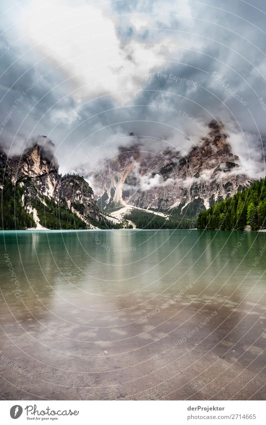 Braies Lake with clouds in the Dolomites VIII Tourism Structures and shapes Copy Space bottom Vacation & Travel Light Copy Space right Shadow Contrast