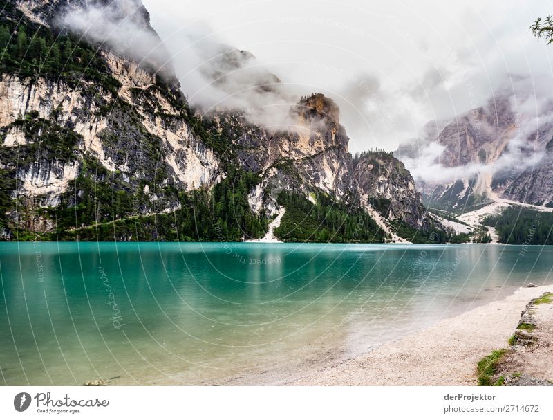 Braies Lake with clouds in the Dolomites XI Tourism Structures and shapes Copy Space bottom Vacation & Travel Light Copy Space right Shadow Contrast