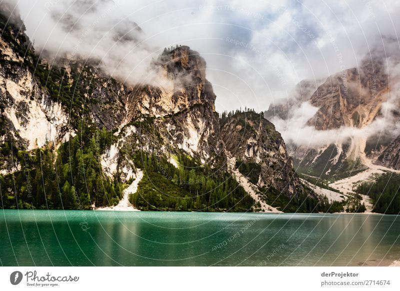 Braies Lake with clouds in the Dolomites VI Tourism Structures and shapes Copy Space bottom Vacation & Travel Light Copy Space right Shadow Contrast