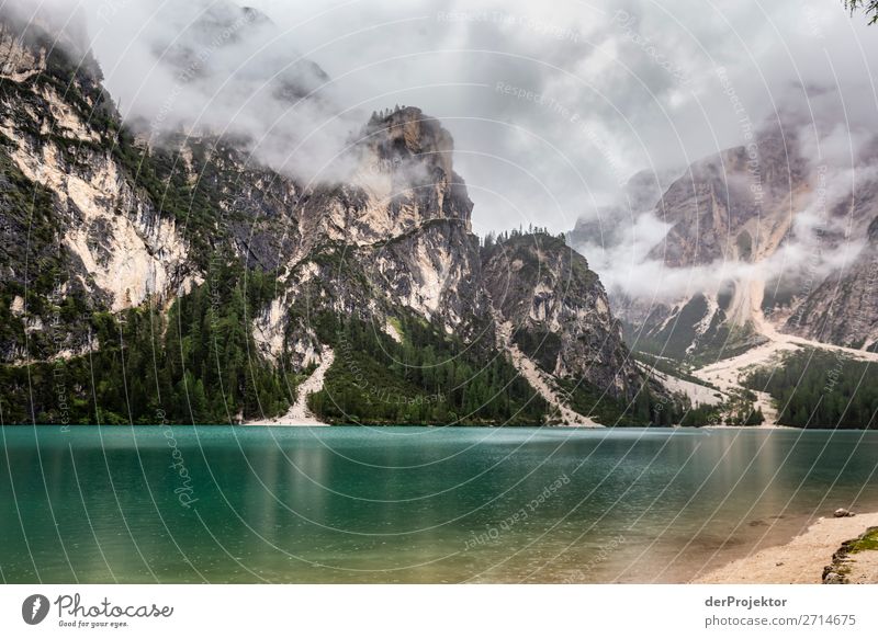 Braies Lake with clouds in the Dolomites IX Tourism Structures and shapes Copy Space bottom Vacation & Travel Light Copy Space right Shadow Contrast