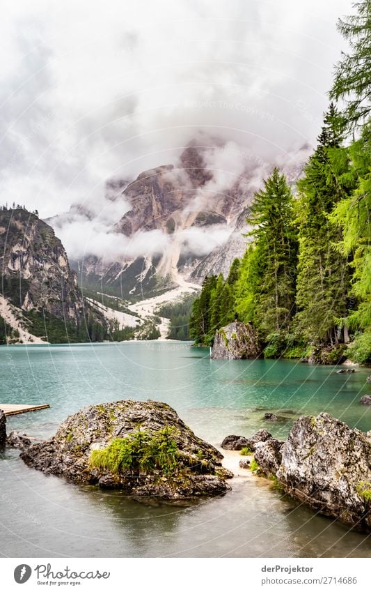 Braies Lake with clouds in the Dolomites II Tourism Structures and shapes Copy Space bottom Vacation & Travel Light Copy Space right Shadow Contrast