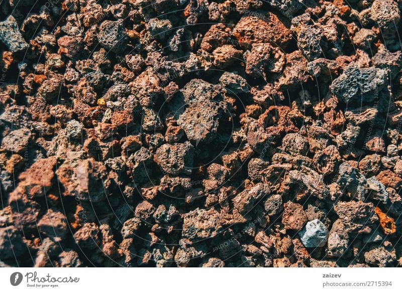 Detail of volcanic rocks Wallpaper Nature Earth Rock Stone Dark Natural Strong Brown Gray Ground Volcanic volcanic soil Geology background close up geological