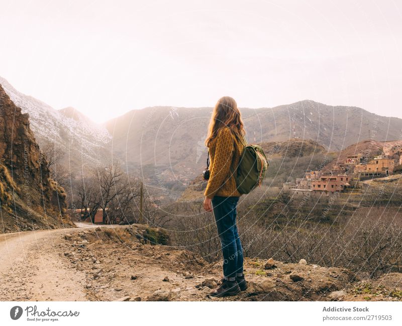 Female tourist with backpack Tourist Backpack Woman Village Vacation & Travel residential Tourism Culture Monument traveler Destination Architecture Landmark