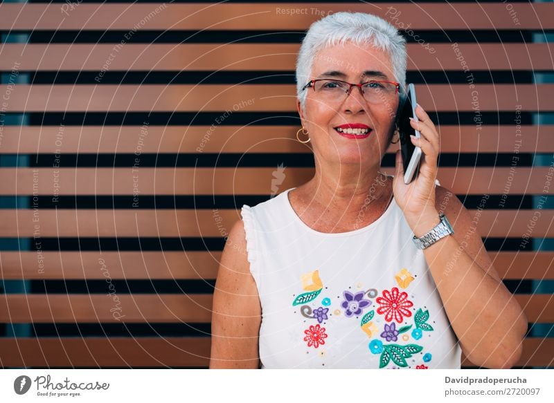 Happy elderly woman on the mobile phone Woman grey hair Old Cellphone PDA Technology Portrait photograph Beauty Photography Communication Cheerful retired