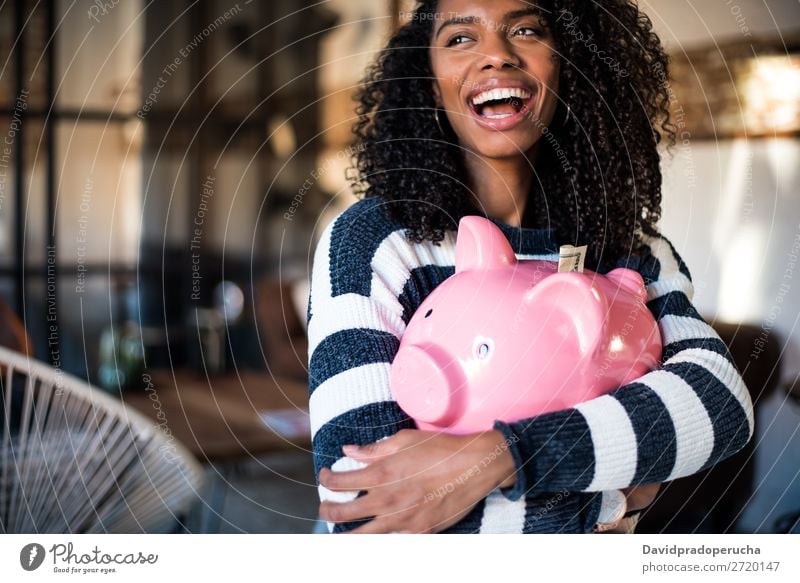 Black woman hugging her piggy bank Woman Money box savings Success Business cash Coin US Dollar Beautiful Happy Cheerful investment wealth Budget
