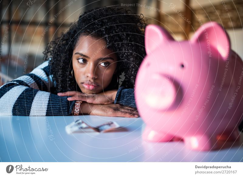 Sad frustrated black woman with piggy bank Woman Money box debt Crisis Sadness Budget Anger worried Financial Industry annoyed Stress Considerate Problem
