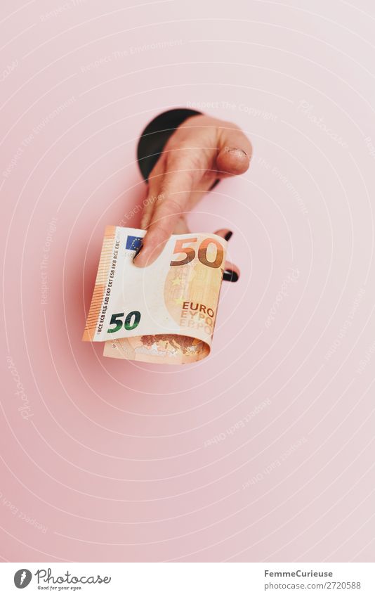 Hand of a woman holding a 50 Euro note Feminine 1 Human being Fitness € Fingers To hold on Financial Financial Industry Bank note Money Give Circle Low-cut Pink