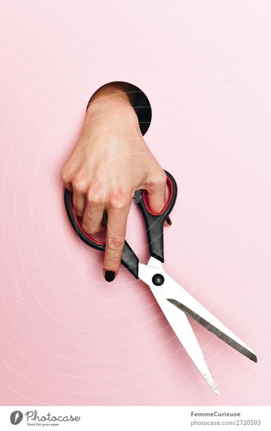 A woman's hand holding scissors Feminine 1 Human being Stationery Paper Creativity Scissors cut Handicraft Pink Circle Low-cut Tailoring Cut off Colour photo