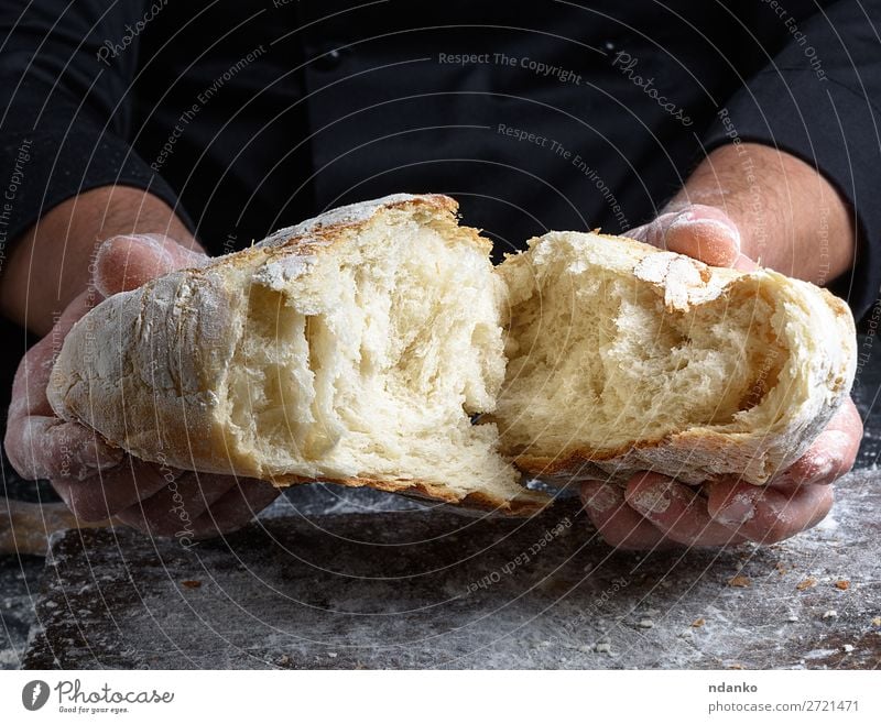 fresh baked white wheat flour bread Dough Baked goods Bread Nutrition Table Kitchen Human being Hand Fingers Wood Make Dark Fresh Brown Black White Tradition