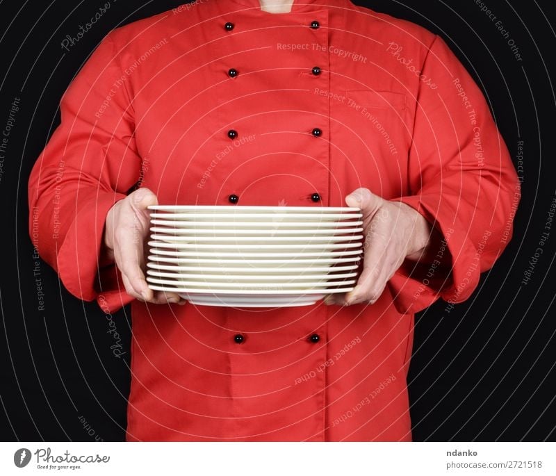 cook in red uniform holds plates Plate Kitchen Restaurant Profession Cook Human being Man Adults Hand Dark Black White show Caucasian ceramic chef cooking