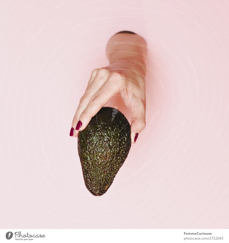 Hand of a woman holding an avocado 1 Human being To enjoy Healthy Eating Vegan diet Vegetarian diet Avocado To hold on Pink Vitamin Nail polish Illustration