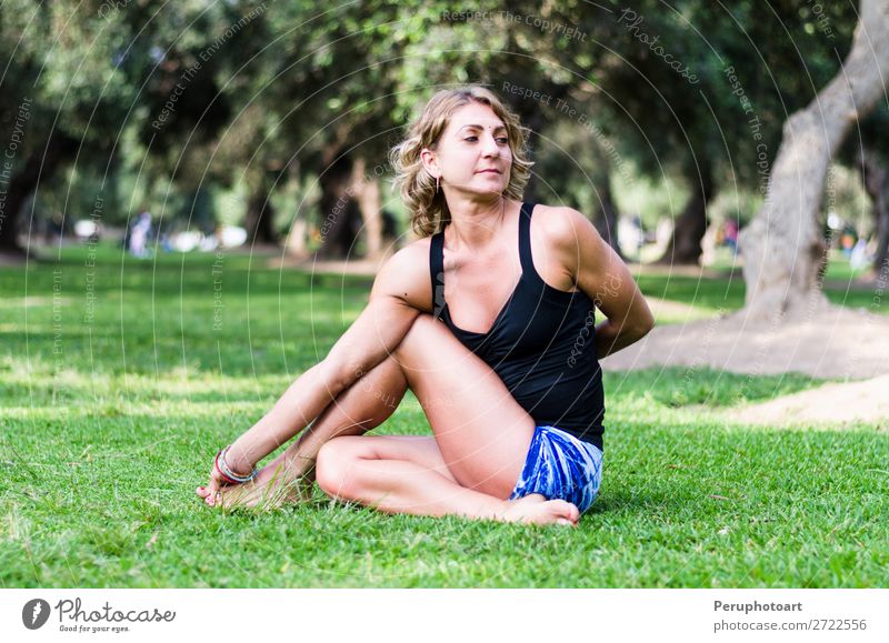 Pretty woman doing yoga exercises in the park Lifestyle Happy Beautiful Body Health care Wellness Harmonious Relaxation Leisure and hobbies Summer Sports Yoga