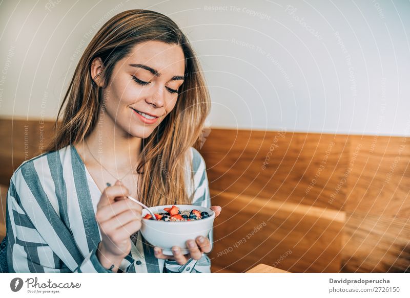 woman close up eating oat and fruits bowl for breakfast Bowl Breakfast Woman Cereal porridge Hand Crops Strawberry Blueberry Oats Healthy Food White Organic
